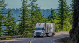 Venture transport truck driving mountain road